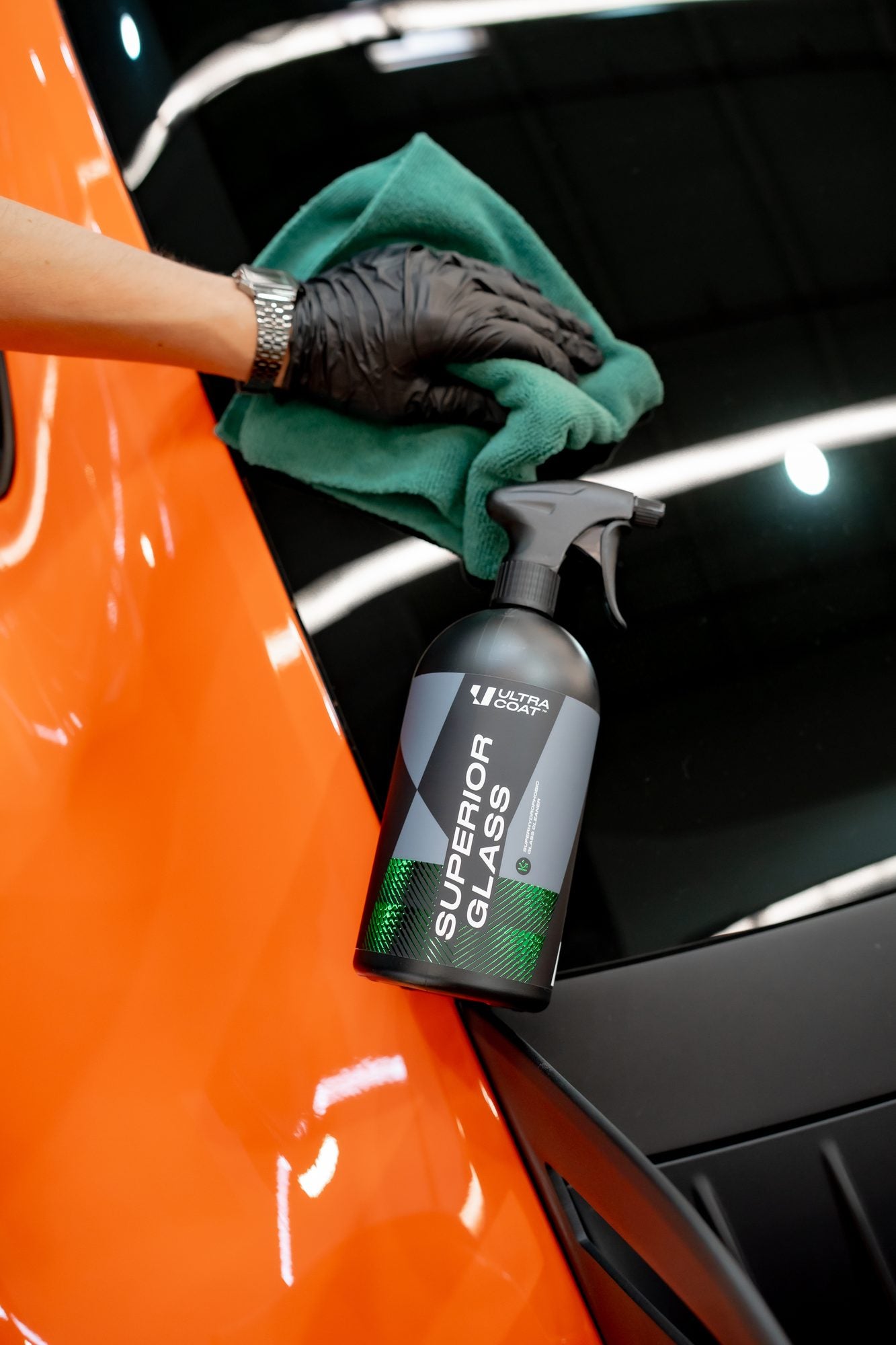 Ultracoat Superior Glass used on glass beside orange Porsche bodywork